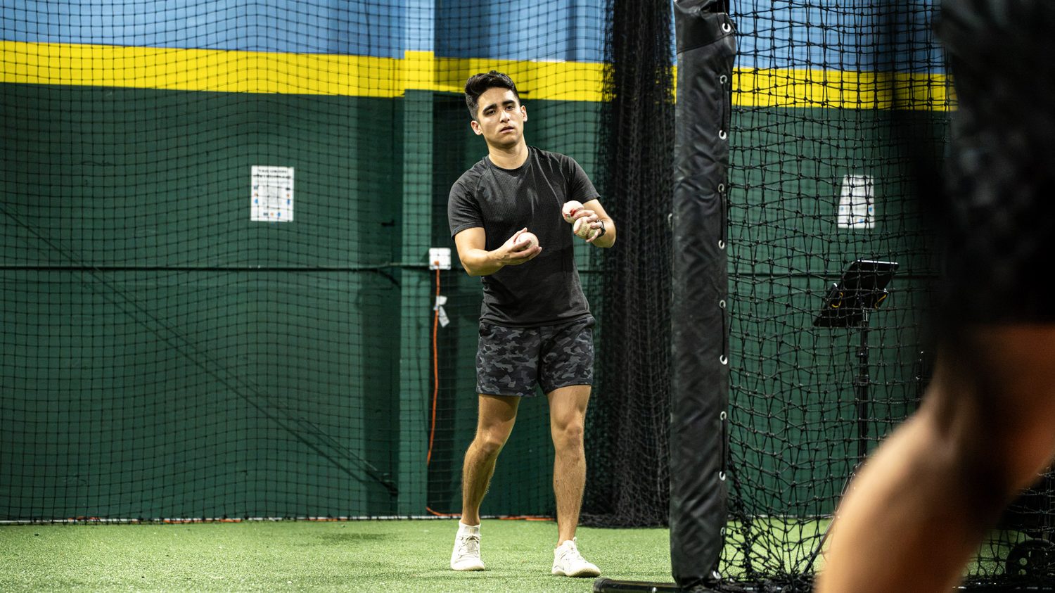 Jeremiah Alonzo coaching a hitter